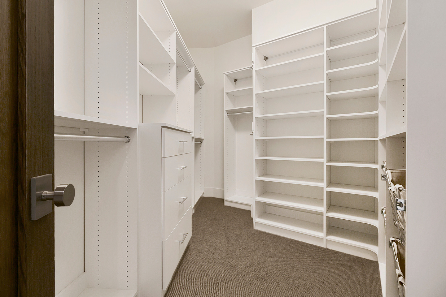 Large cabinetry leading to closet